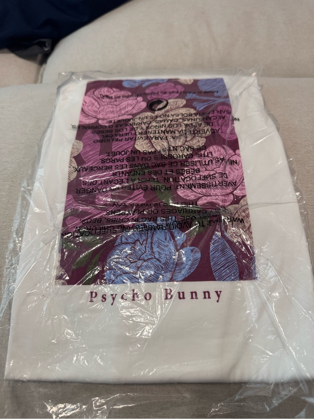 Psycho Bunny White Tee with Purple Floral Graphic